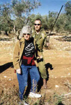 Gila under arrest by Israeli soldier with dog - photo by JudyKirshner