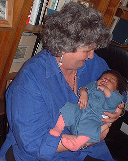 Joan Holding Archivette (very young infant)