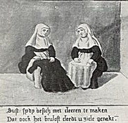 Two beguines sit talking while sewing